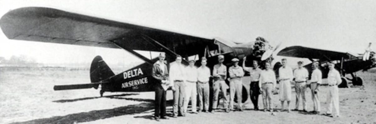 A group photo in 1929 shows the original Delta Air Service crew of pilots and mechanics including C.E. Woolman, second from left and John Howe, who piloted Delta's first scheduled flight, on his right. This photo is from the book, "Delta: An Airline and Its Aircraft: The Illustrated History of a Major U.S. Airline and the People Who Made It" by R.E.G. Davies, published by Paladwr Press.