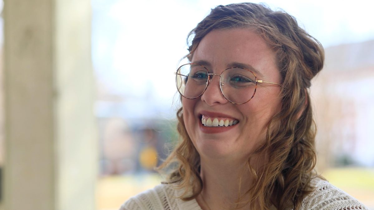 Rachel Umana, Executive Director of Bike Walk Macon, smiles during an interview with students from the Reg Murphy Center for Collaborative Journalism. 