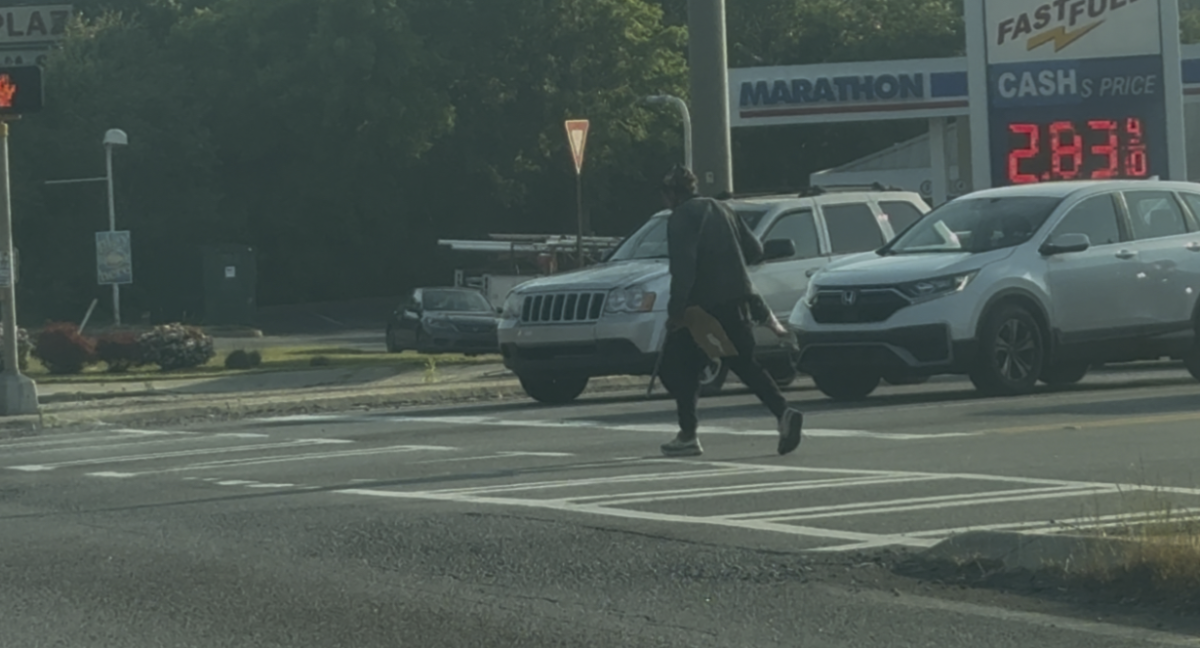 A man is seen using the crosswalk to cross a busy intersection in Macon Georgia, where Gray Highway and Shurling Drive meet. Photo taken by Jackson Bramlett.
