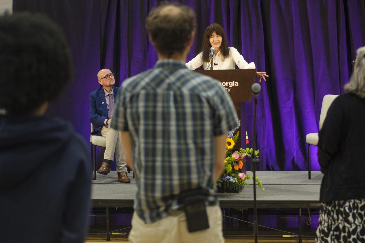 Former U.S. poet laureate Joy Harjo answers questions from the audience after a reading at Middle Georgia State University in Macon recently. The reading was made possible in part by the Georgia Humanities Council.