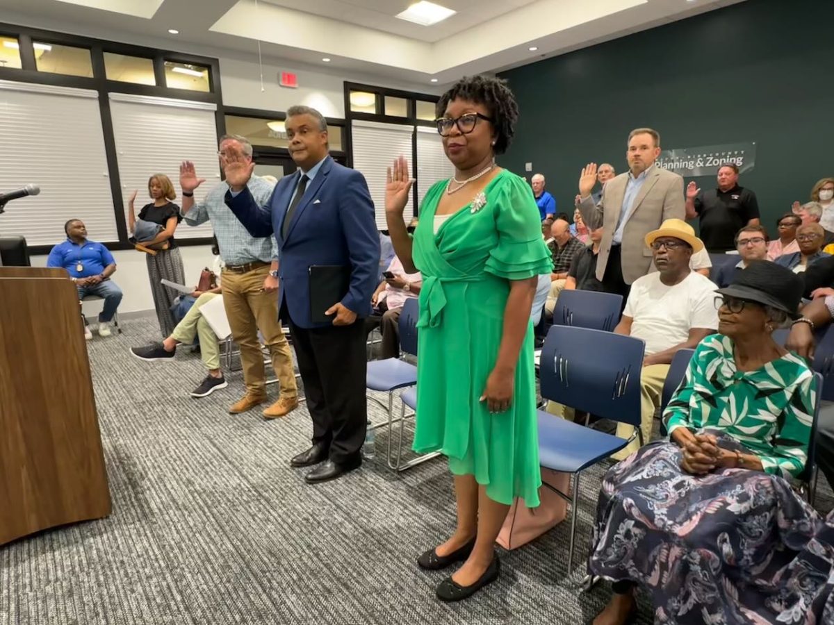 Those testifying take an oath at the Aug. 25 hearing of the Macon-Bibb County Planning & Zoning Commission.