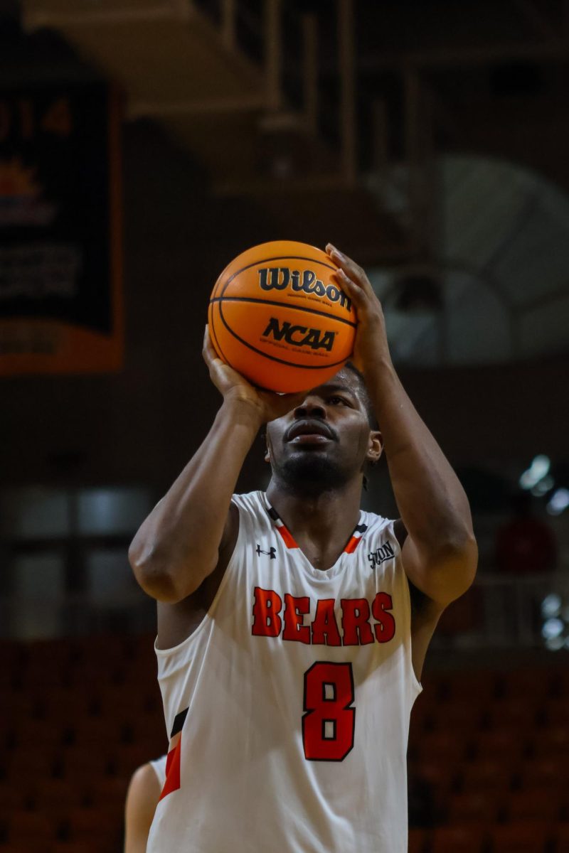 Forward Bendji Pierre '26 shooting a free throwing at the line after getting fouled on a previous play. 