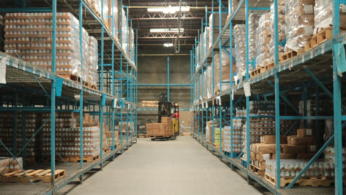 A Middle Georgia Community Food Bank employee loads boxes of food onto shelves at the food bank warehouse on October 15, 2025.
