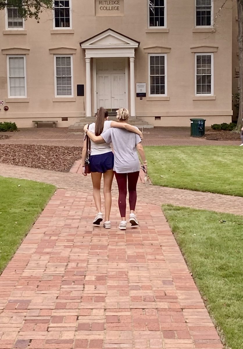 Two friends, one sunny stroll, the perfect ‘Hot Girl Walk.’