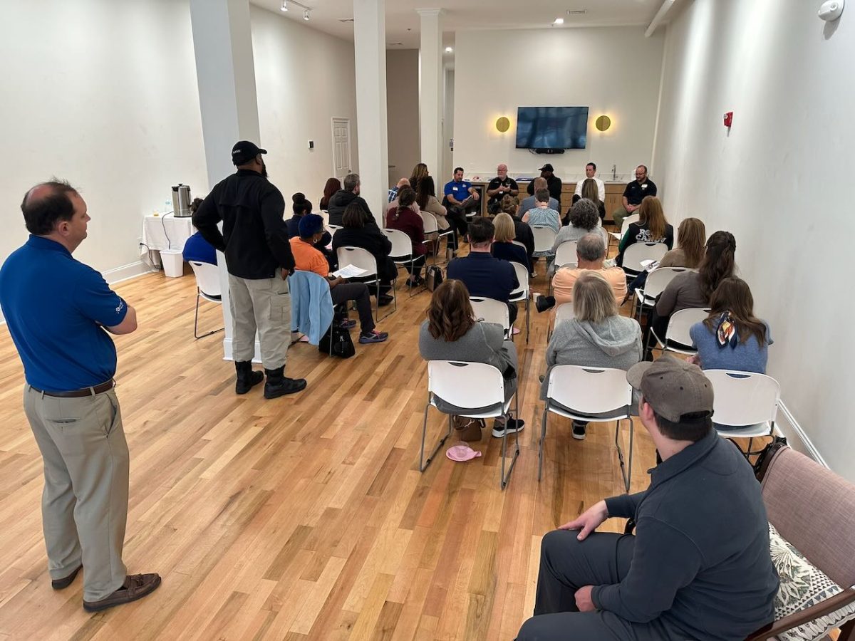 A Downtown Macon Community Association roundtable discusses how to respond to issues concerning unhoused individuals during its March meeting at the Wesleyan Leadership Lab on Cherry Street.