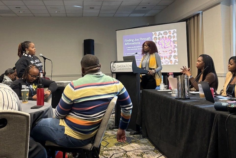 Gabrielle Haggins, doctoral student and graduate teaching assistant at the University of Illinois Urbana-Champaign, speaking at the Association for the Study of the Higher Education 50th annual conference in Denver, CO. (Photo provided by Derrick Woodard)