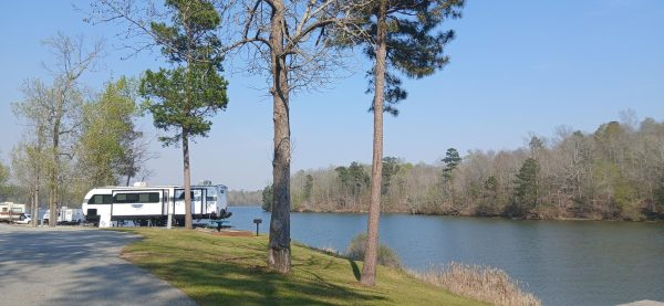A white camper siting on Clovis Point at Arrowhead Campground on March 20th 2026.