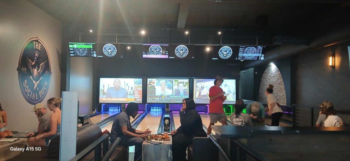 People enjoying the food and having fun while bowling inside the Social Duck on April 22, 2026