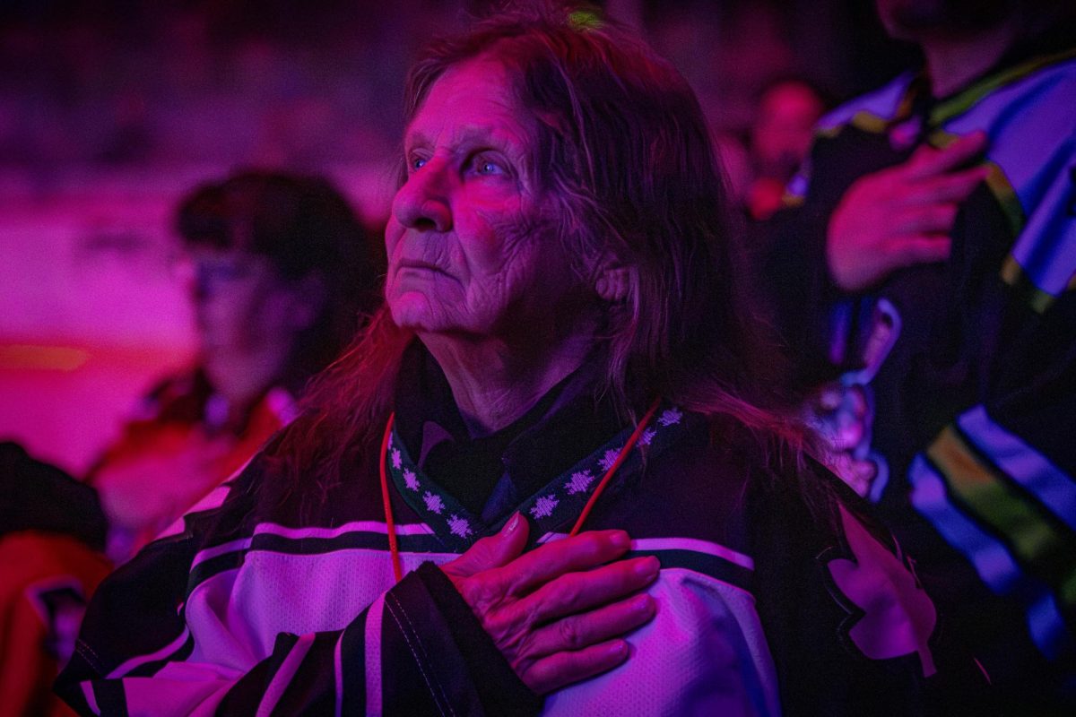 Fan participates in the National Anthem at prior to the puck drop at Macon Mayhem's playoff game against the Peoria Rivermen on Thursday, April 9, 2026.