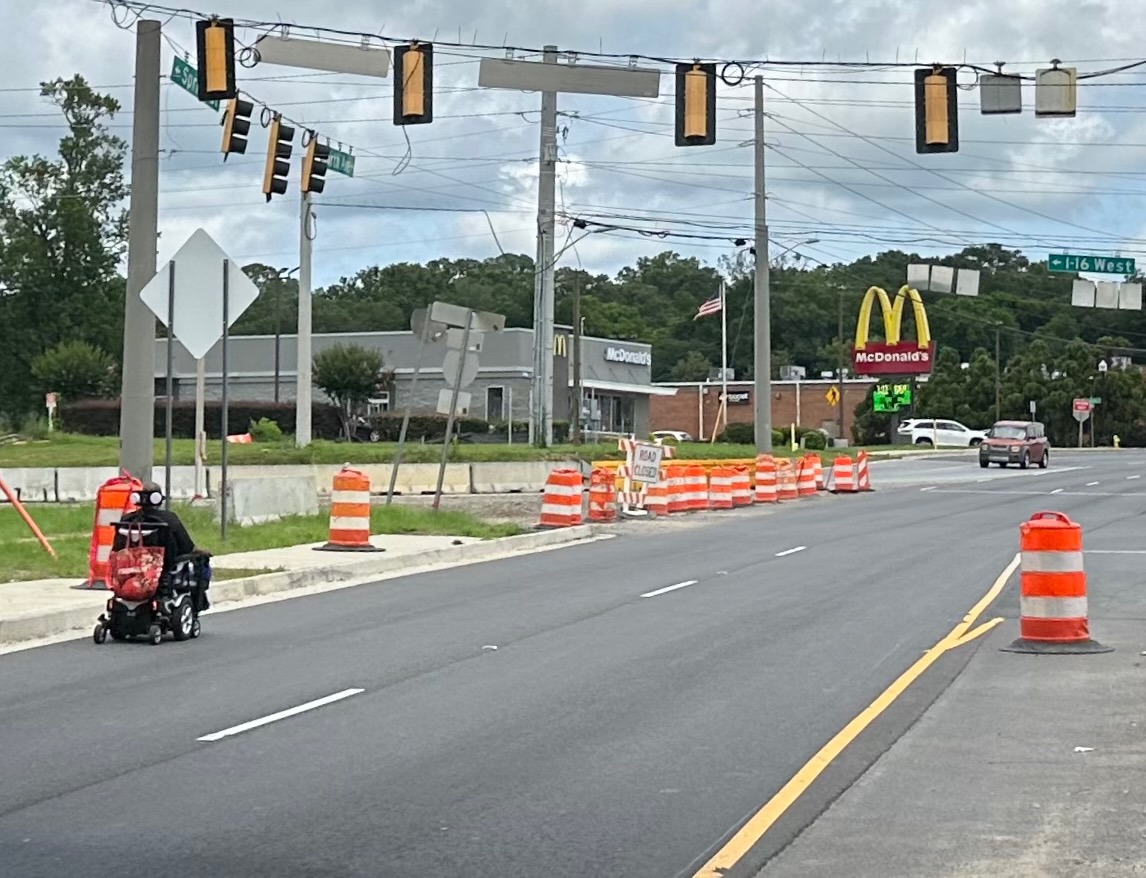 Closure of the sidewalk forced a man in a wheelchair onto the oncoming lane of traffic on North Avenue near Interstate 16 in late June. 